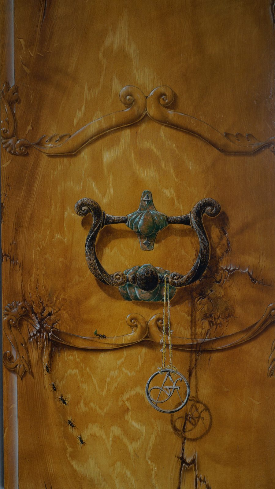 Trompe-l'œil de poignée et serrure sur faux bois